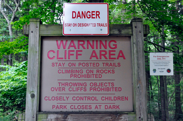 warning sign about dangerous cliffs